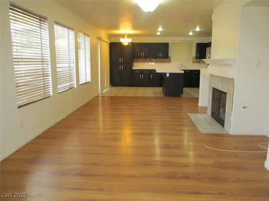 Chandelier, Fireplace, Interior, Kitchen, Recessed Lighting, Wood Texture Flooring