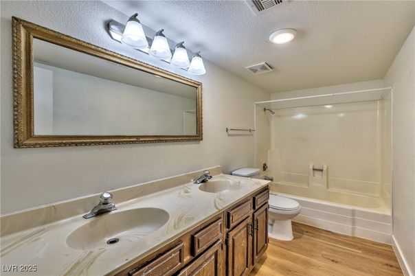 Bathroom, Dual Sink Vanities, Interior, Recessed Lighting, Wood Texture Flooring