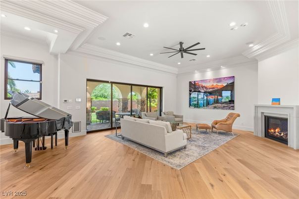 Fireplace, Interior, Living room, Piano, Recessed Lighting, Wood Texture Flooring