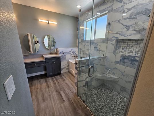 Bathroom, Glass Shower, Interior, Marble Walls, Recessed Lighting, Wood Texture Flooring