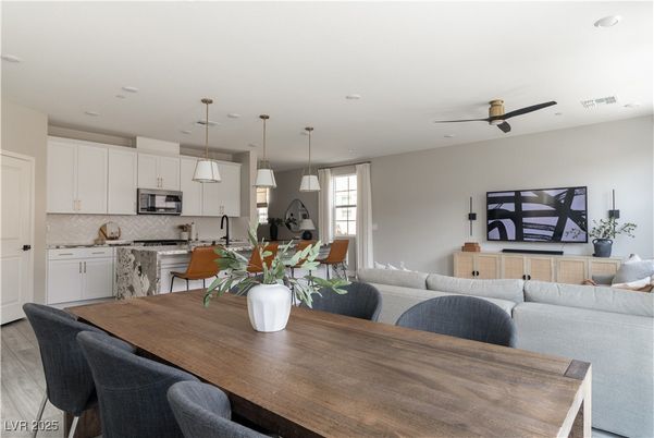 Dining room, Interior, Kitchen, Living room, Pendant Lights, Recessed Lighting, Stainless Steel Appliances, Wood Texture Flooring