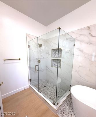 Bathroom, Free Standing Baths, Glass Shower, Interior, Marble Walls, Wood Texture Flooring