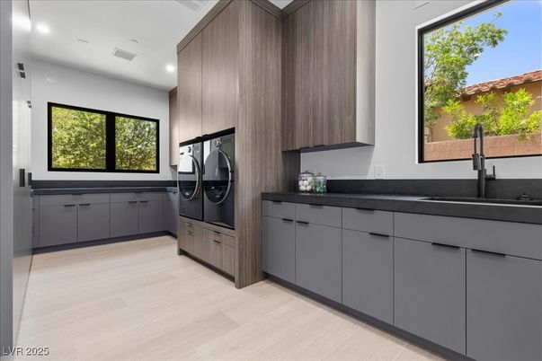 Interior, Kitchen, Recessed Lighting, Washer, Wood Texture Flooring