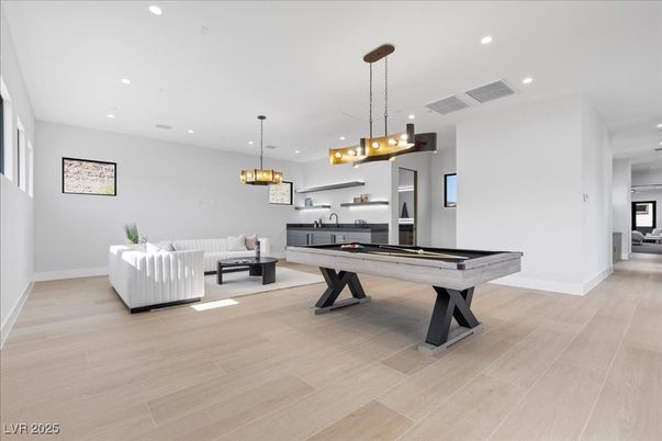 Billiard Table, Game Room, Interior, Living room, Pendant Lights, Recessed Lighting, Wood Texture Flooring