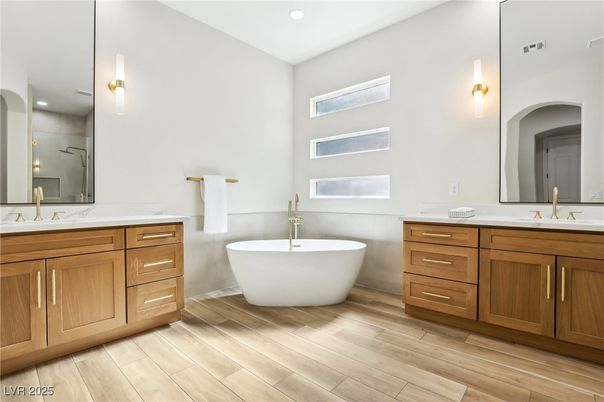 Bathroom, Dual Sink Vanities, Free Standing Baths, Interior, Recessed Lighting, Wood Texture Flooring