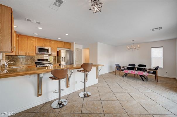 Chandelier, Dining room, Interior, Kitchen, Recessed Lighting, Stainless Steel Appliances