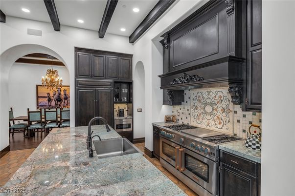 Chandelier, Dining room, Interior, Kitchen, Recessed Lighting, Stainless Steel Appliances, Wooden Beams, Wood Texture Flooring