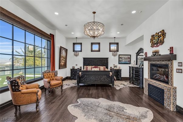 Bedroom, Chandelier, Fireplace, Interior, Pendant Lights, Recessed Lighting, Wood Texture Flooring
