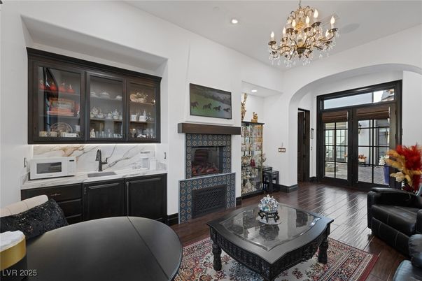 Chandelier, Fireplace, Interior, Living room, Recessed Lighting, Wood Texture Flooring