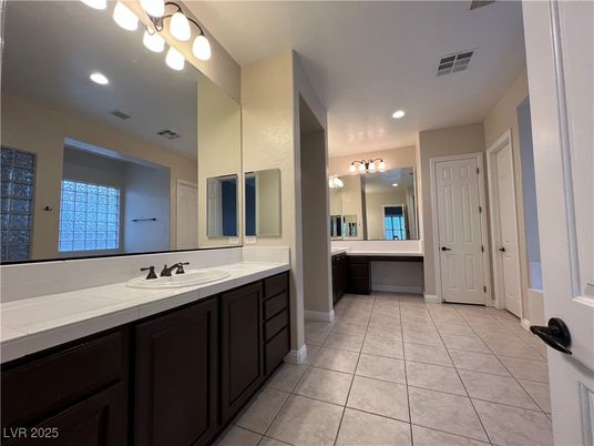 Bathroom, Dual Sink Vanities, Interior, Recessed Lighting, Tile Countertops