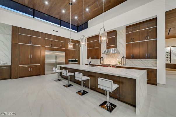 Interior, Kitchen, Marble Walls, Pendant Lights, Recessed Lighting, Stainless Steel Appliances, Wooden Ceilings