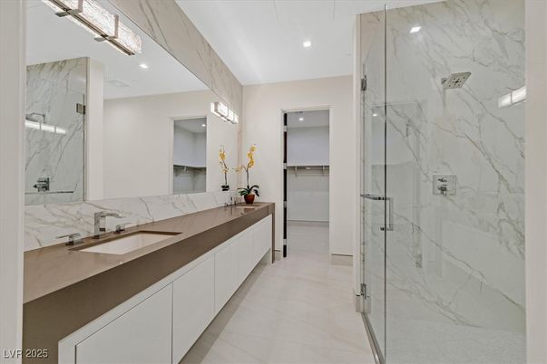 Bathroom, Dual Sink Vanities, Glass Shower, Interior, Marble Walls, Recessed Lighting