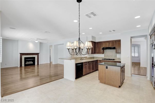 Chandelier, Fireplace, Interior, Kitchen, Recessed Lighting, Wood Texture Flooring
