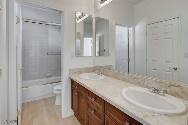 Bathroom, Dual Sink Vanities, Glass Shower, Interior, Wood Texture Flooring