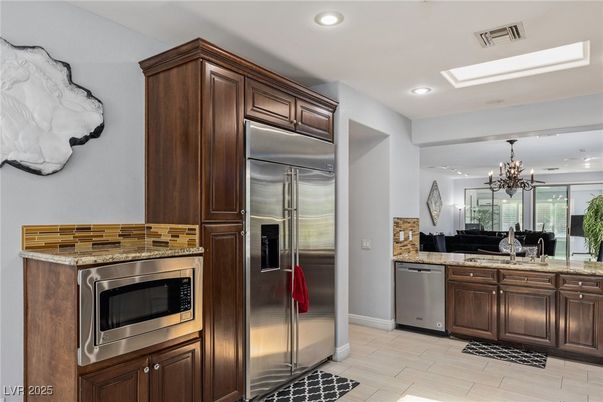 Chandelier, Interior, Kitchen, Recessed Lighting, Stainless Steel Appliances, Wood Texture Flooring