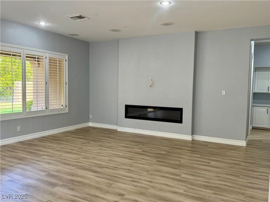 Empty room, Fireplace, Interior, Recessed Lighting, Wood Texture Flooring