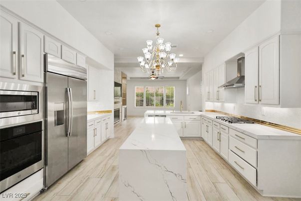 Chandelier, Interior, Kitchen, Recessed Lighting, Stainless Steel Appliances, Wood Texture Flooring