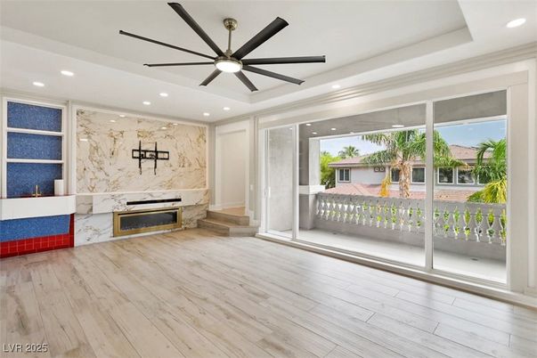 Fireplace, Interior, Marble Walls, Recessed Lighting, Wood Texture Flooring
