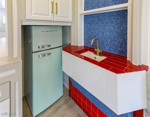 Interior, Kitchen, Tile Countertops, Wood Texture Flooring