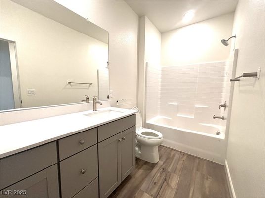 Bathroom, Dual Sink Vanities, Interior, Recessed Lighting, Wood Texture Flooring