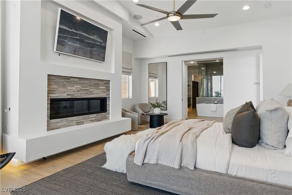 Bedroom, Fireplace, Interior, Recessed Lighting, Wood Texture Flooring
