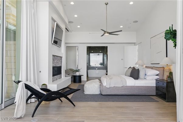 Bedroom, Fireplace, Interior, Recessed Lighting, Wood Texture Flooring