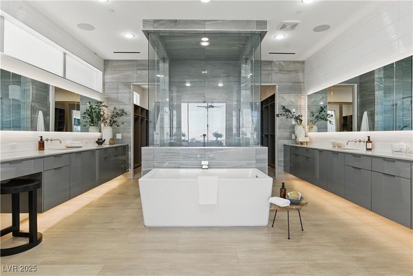 Bathroom, Dual Sink Vanities, Free Standing Baths, Glass Shower, Interior, Recessed Lighting, Wood Texture Flooring