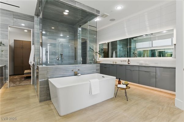 Bathroom, Dual Sink Vanities, Free Standing Baths, Glass Shower, Interior, Recessed Lighting, Wood Texture Flooring