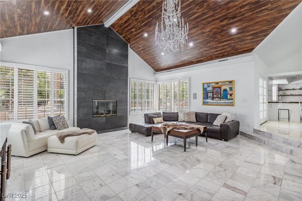 Chandelier, Fireplace, Interior, Living room, Marble, Recessed Lighting, Wooden Ceilings
