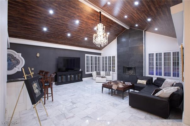 Chandelier, Fireplace, Interior, Living room, Marble, Recessed Lighting, Wooden Ceilings