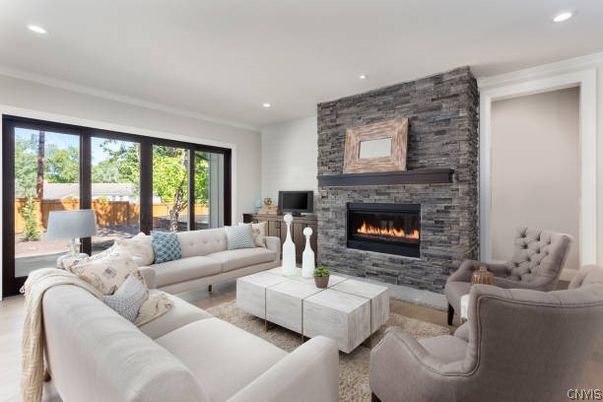 Fireplace, Interior, Living room, Recessed Lighting, Stone Walls, Wood Texture Flooring