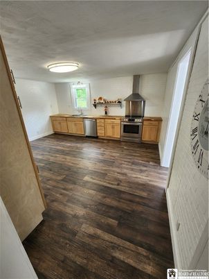 Interior, Kitchen, Stainless Steel Appliances, Stone Walls, Wood Texture Flooring