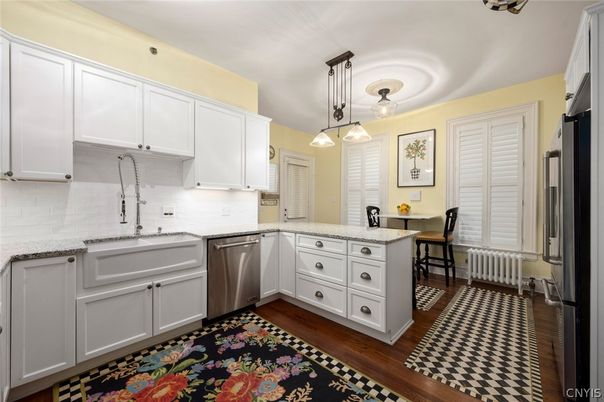 Dining room, Interior, Kitchen, Pendant Lights, Stainless Steel Appliances, Wood Texture Flooring