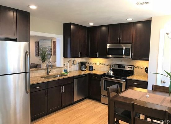 Dining room, Interior, Kitchen, Recessed Lighting, Stainless Steel Appliances, Wood Texture Flooring