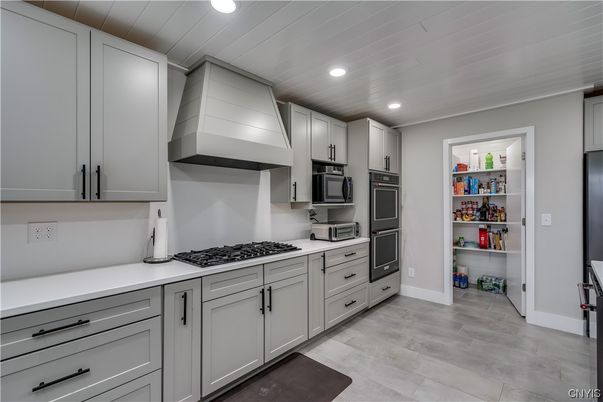 Interior, Kitchen, Recessed Lighting, Stainless Steel Appliances, Wood Texture Flooring