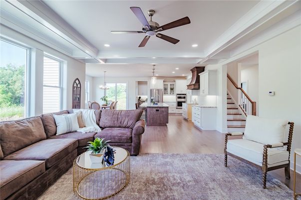 Chandelier, Dining room, Interior, Kitchen, Living room, Pendant Lights, Recessed Lighting, Stainless Steel Appliances, Wood Texture Flooring