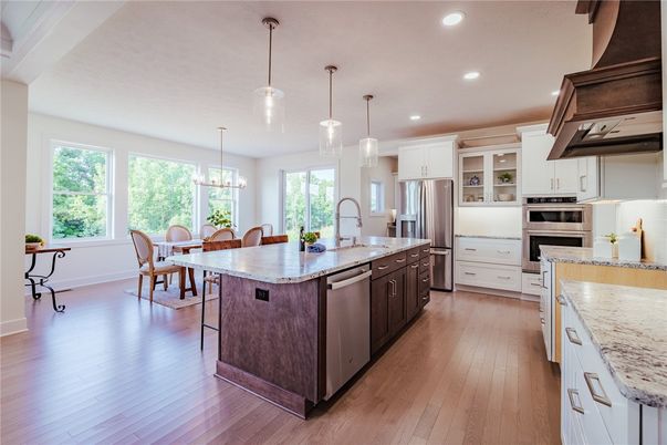 Dining room, Interior, Kitchen, Pendant Lights, Recessed Lighting, Stainless Steel Appliances, Wood Texture Flooring
