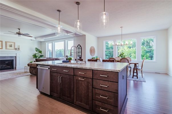 Dining room, Fireplace, Interior, Kitchen, Pendant Lights, Wood Texture Flooring