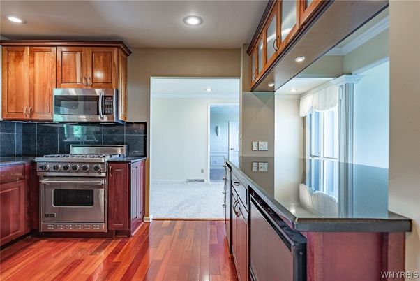 Interior, Kitchen, Recessed Lighting, Stainless Steel Appliances, Wood Texture Flooring