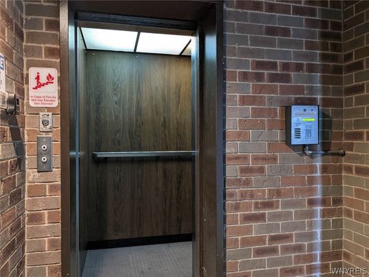 Elevator, Interior, Stone Walls