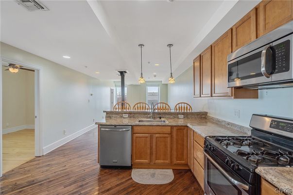 Interior, Kitchen, Pendant Lights, Recessed Lighting, Stainless Steel Appliances, Wood Texture Flooring