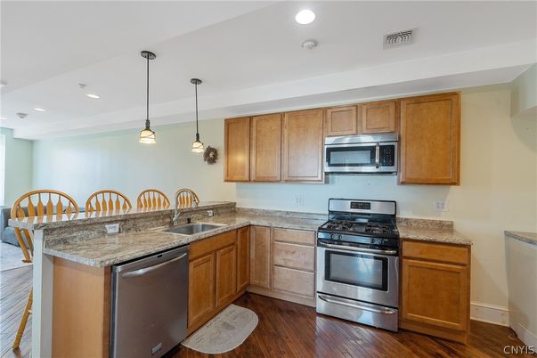 Interior, Kitchen, Pendant Lights, Recessed Lighting, Stainless Steel Appliances, Wood Texture Flooring