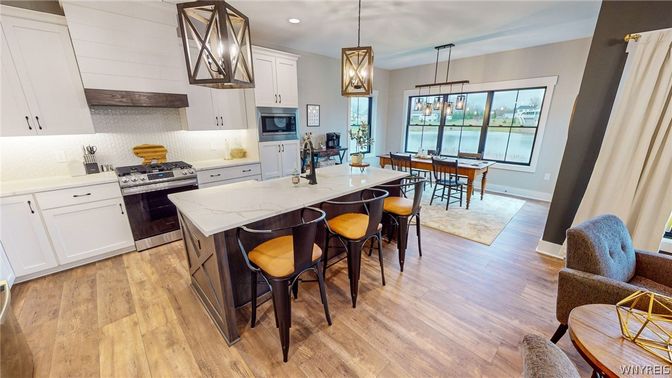 Dining room, Interior, Kitchen, Pendant Lights, Recessed Lighting, Stainless Steel Appliances, Water, Wood Texture Flooring