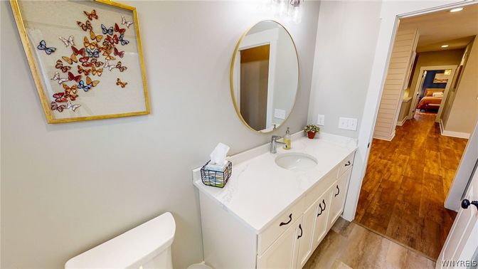 Bathroom, Dual Sink Vanities, Interior, Recessed Lighting, Wood Texture Flooring