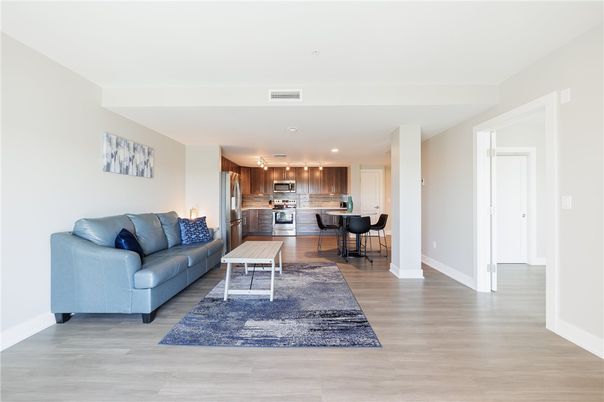 Dining room, Interior, Kitchen, Living room, Recessed Lighting, Stainless Steel Appliances, Wood Texture Flooring