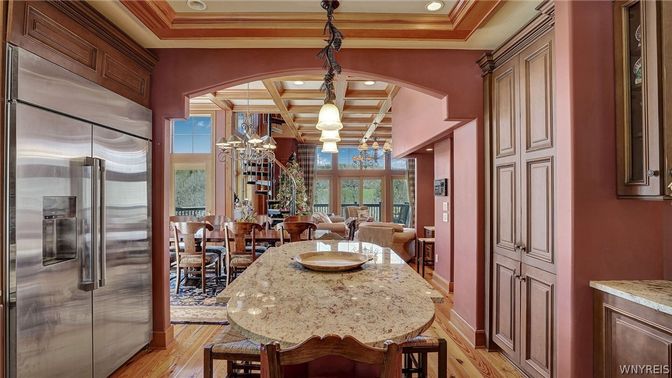 Chandelier, Dining room, Interior, Kitchen, Pendant Lights, Recessed Lighting, Stainless Steel Appliances, Wooden Beams, Wood Texture Flooring