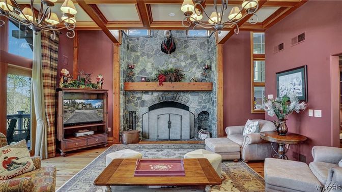Chandelier, Fireplace, Interior, Living room, Stone Walls, Wooden Beams, Wood Texture Flooring