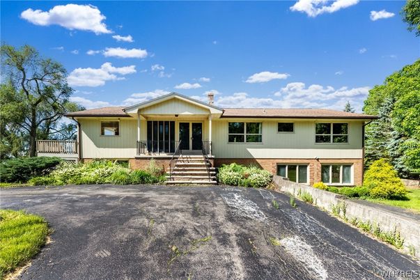 Exterior, Facade, Brick Facade, Raised Ranch