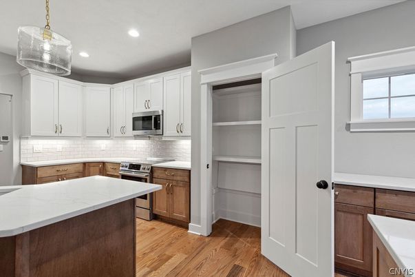 Interior, Kitchen, Pendant Lights, Recessed Lighting, Stainless Steel Appliances, Wood Texture Flooring