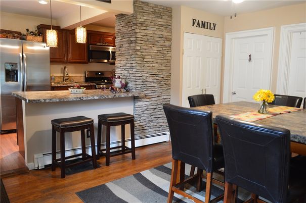 Interior, Kitchen, Pendant Lights, Recessed Lighting, Stainless Steel Appliances, Stone Walls, Wood Texture Flooring